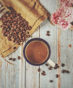 High angle view of coffee cup on table