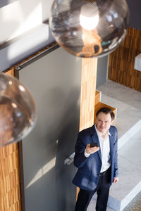 High angle view of businessman at home