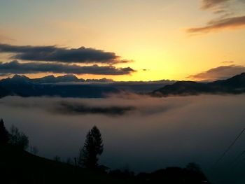 Scenic view of mountains at sunset