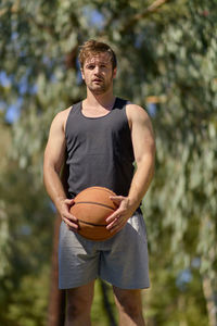 Man playing with ball at park