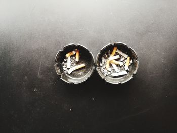 High angle view of cigarette on table