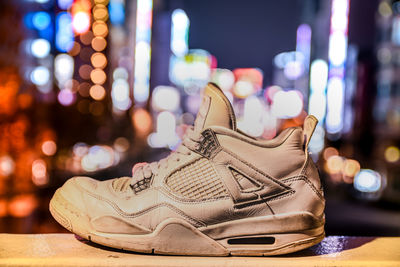 Close-up of shoes on table