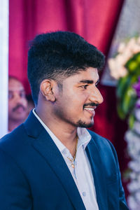 Portrait of young man looking away