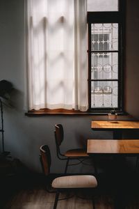 Empty chairs and table at home