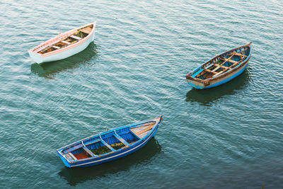 High angle view of sailboat sailing in sea