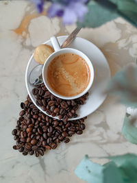 High angle view of coffee cup on table