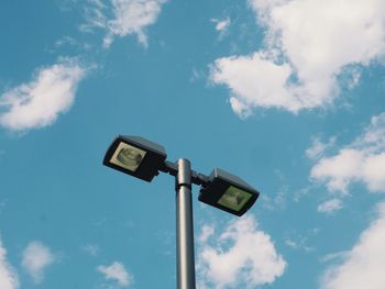 Low angle view of street light against sky