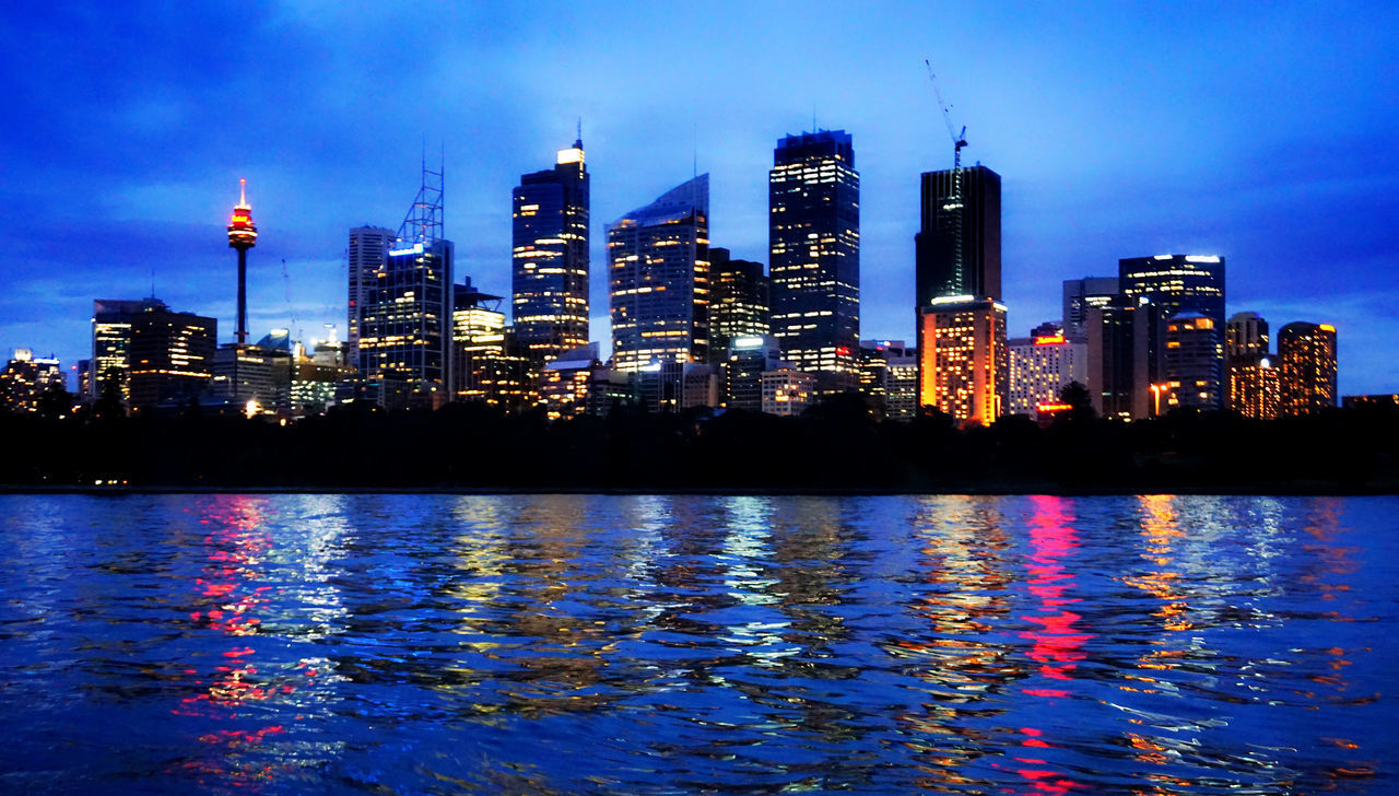 City Cityscape Urban Skyline Water Illuminated Modern Skyscraper Reflection Blue Business Finance And Industry Financial District  Tall - High River Standing Water Arch Bridge Building Story Building Story City Location Infrastructure Riverbank China Central Television Tower Wide Shot Communications Tower Downtown District Skyline Clock Tower Tall Wide China World Trade Center