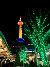 Illuminated buildings in city at night