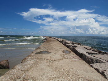 Scenic view of calm sea against sky