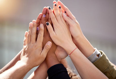 Low section of woman with hands