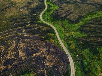 High angle view of road amidst trees