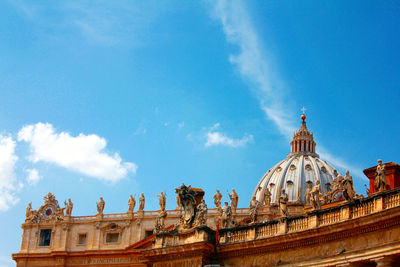 Low angle view of temple against cloudy sky