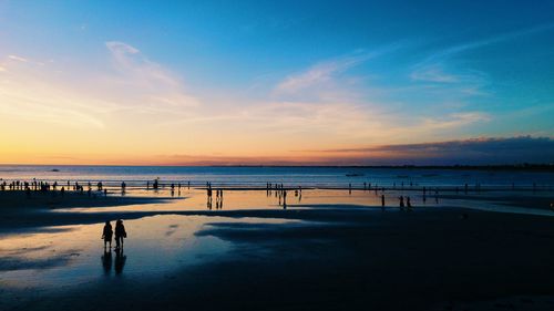 Scenic view of sea at sunset