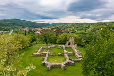 Mecseknadasd, hungary - aerial view about schlossberg church ruins surrounded by forest.