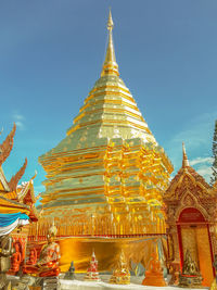 Low angle view of pagoda against building