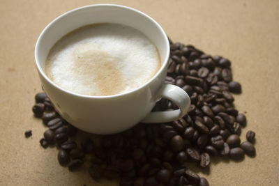 High angle view of coffee cup on table