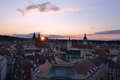 High angle view of city at sunset