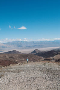 Scenic view of landscape against blue sky