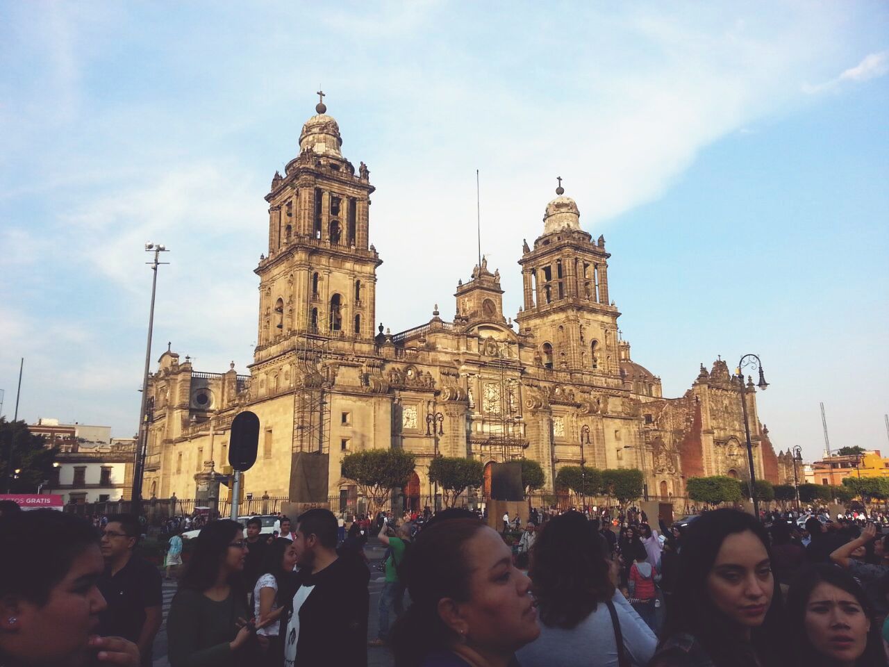 large group of people, building exterior, real people, sky, architecture, built structure, religion, men, women, cloud - sky, lifestyles, crowd, outdoors, leisure activity, city, spirituality, day, people, adult