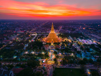 The aerial view of big pagoda in nakhon patom, thailand with sunset background