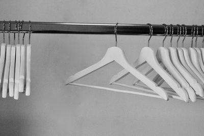Close-up of clothes hanging on wall