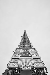 Low angle view of skyscraper against clear sky