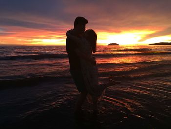 Scenic view of sea at sunset