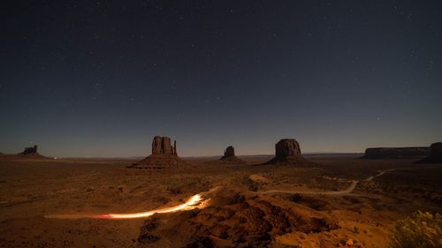 Scenic view of rock formations against sky