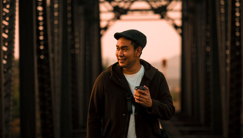 Portrait of young man looking away