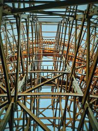 Low angle view of metal structure against sky