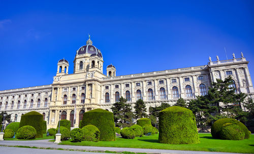 Low angle view of building against blue sky