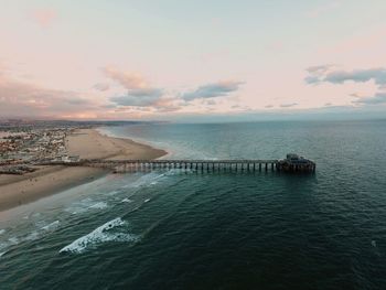 Scenic view of sea against sky at dusk