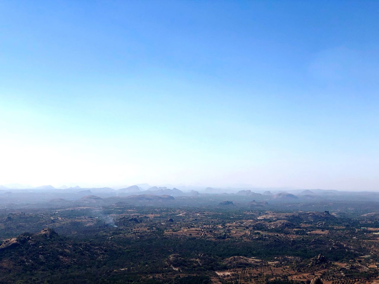 AERIAL VIEW OF TOWNSCAPE AGAINST SKY