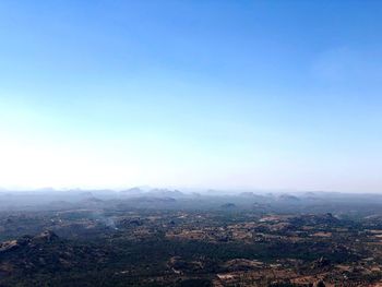 Aerial view of townscape against clear sky