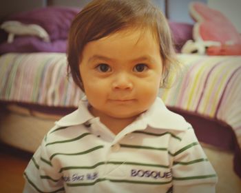 Portrait of baby boy at home