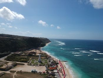 High angle view of people on beach against sky