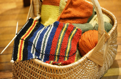 Close-up of multi colored  knitting wool in basket