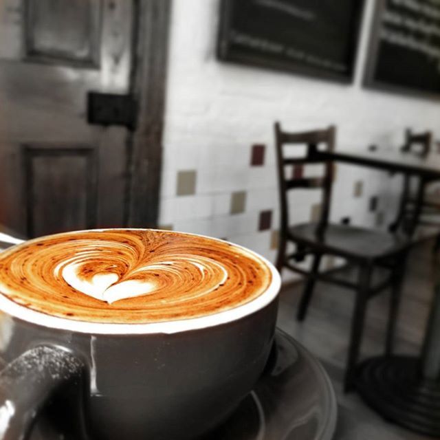 coffee cup, coffee - drink, close-up, indoors, froth art, table, saucer, focus on foreground, still life, frothy drink, cappuccino, refreshment, coffee, drink, food and drink, no people, metal, spiral, selective focus, creativity