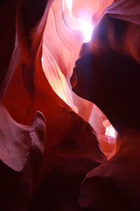 Close-up of illuminated red light at night
