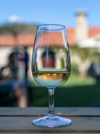 Close-up of wineglass on table