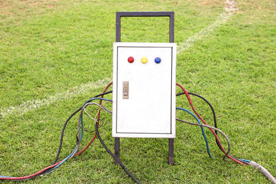 High angle view of cross on field
