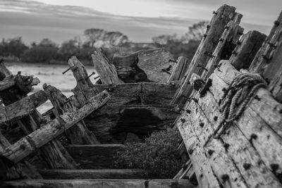 Old ruins of boat against sky