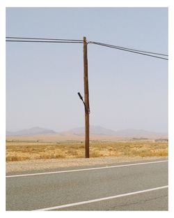 Scenic view of field against clear sky