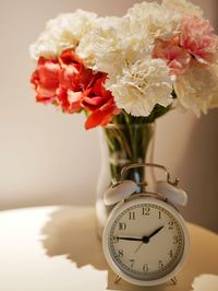 Close-up of flower vase on table