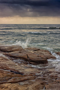 Scenic view of sea at sunset