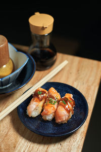 Close-up of sushi served on table