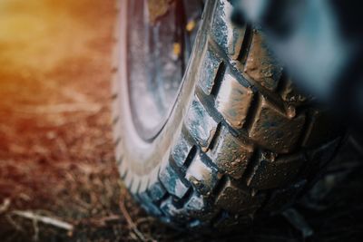 Close-up of vintage car on field