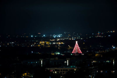 Illuminated cityscape at night