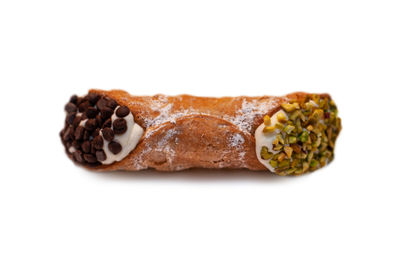 Close-up of bread on white background